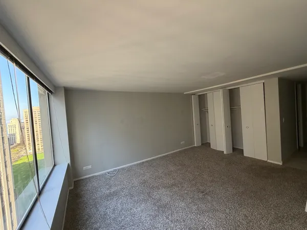 an empty room with windows