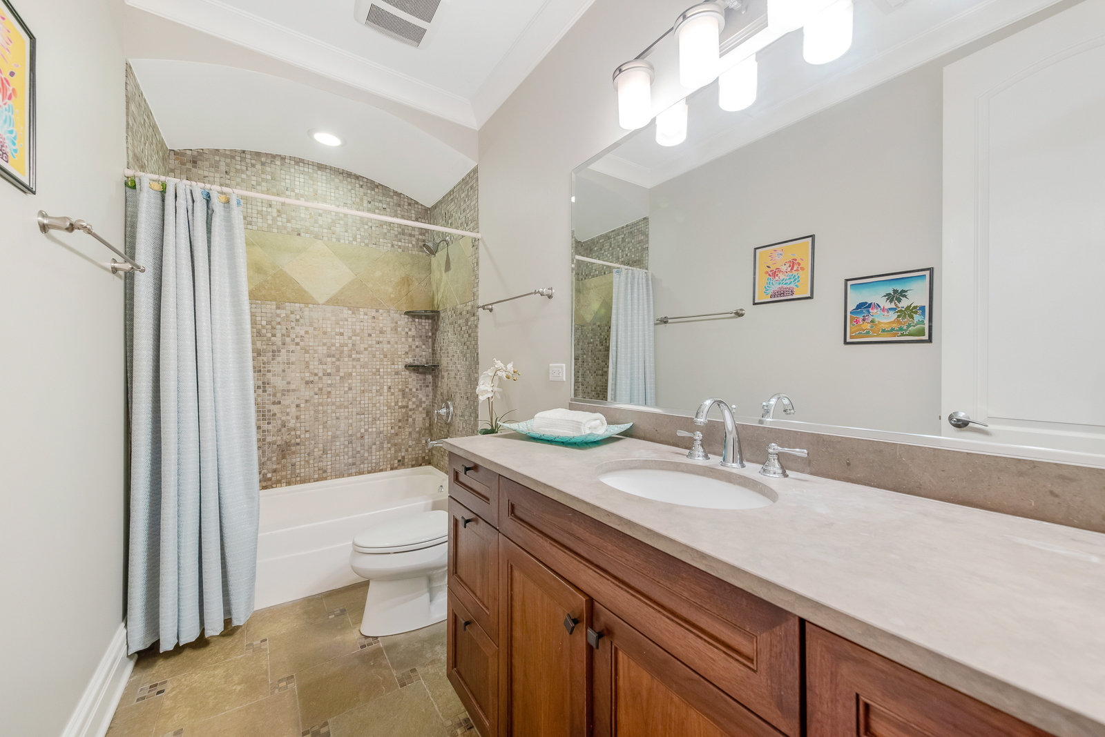 1238 West Jackson Boulevard, Unit 2W Chicago, IL 60607 - Photo 7 of 12 a bathroom with a granite countertop sink toilet and shower