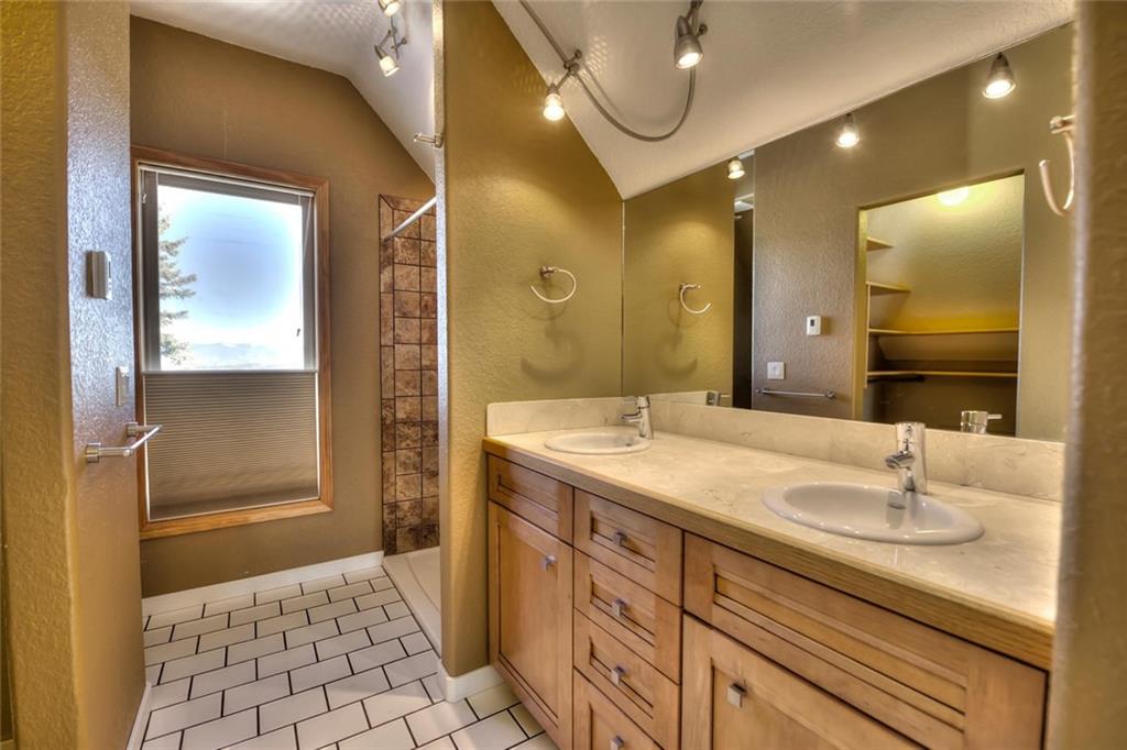 138 Teton Way Como, CO 80432 - Photo 13 of 35 a bathroom with a sink a toilet and shower