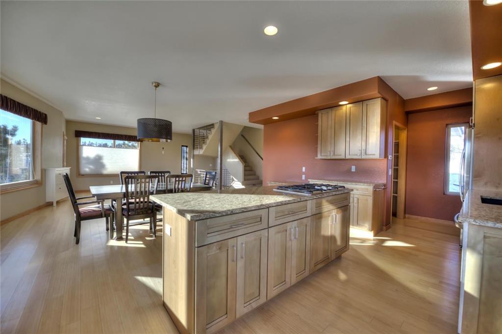 138 Teton Way Como, CO 80432 - Photo 16 of 35 a kitchen with stove and cabinets