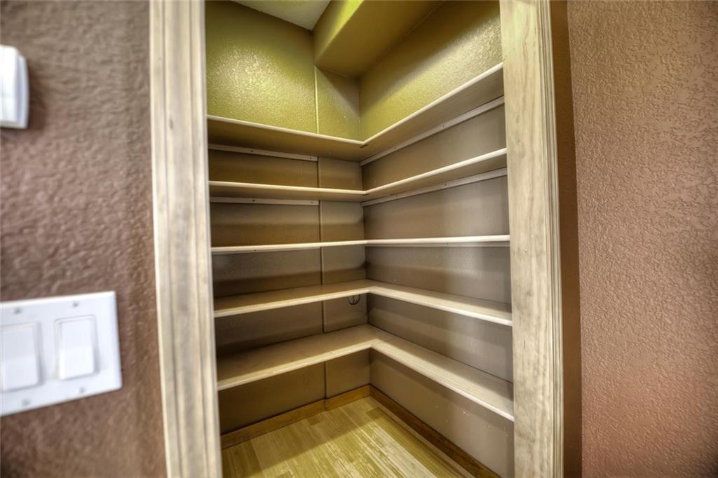 138 Teton Way Como, CO 80432 - Photo 18 of 35 a view of walk in closet with empty racks