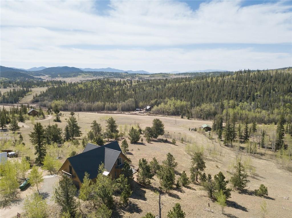 138 Teton Way Como, CO 80432 - Photo 31 of 35 a view of lake with mountain in background