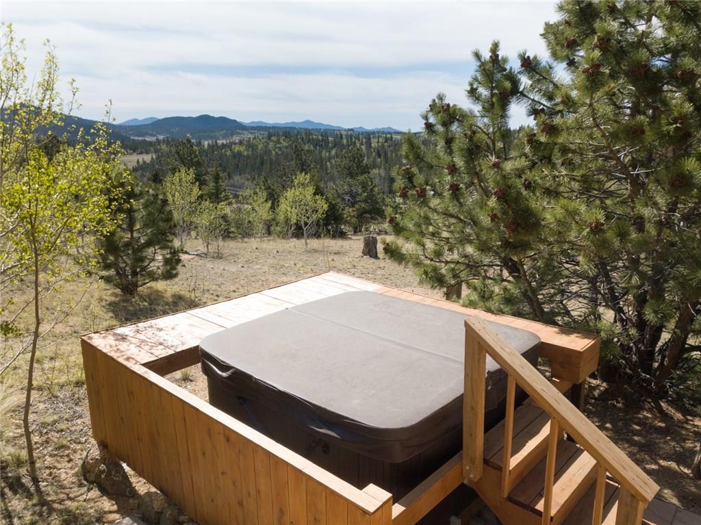 138 Teton Way Como, CO 80432 - Photo 34 of 35 a view of a balcony with two chairs