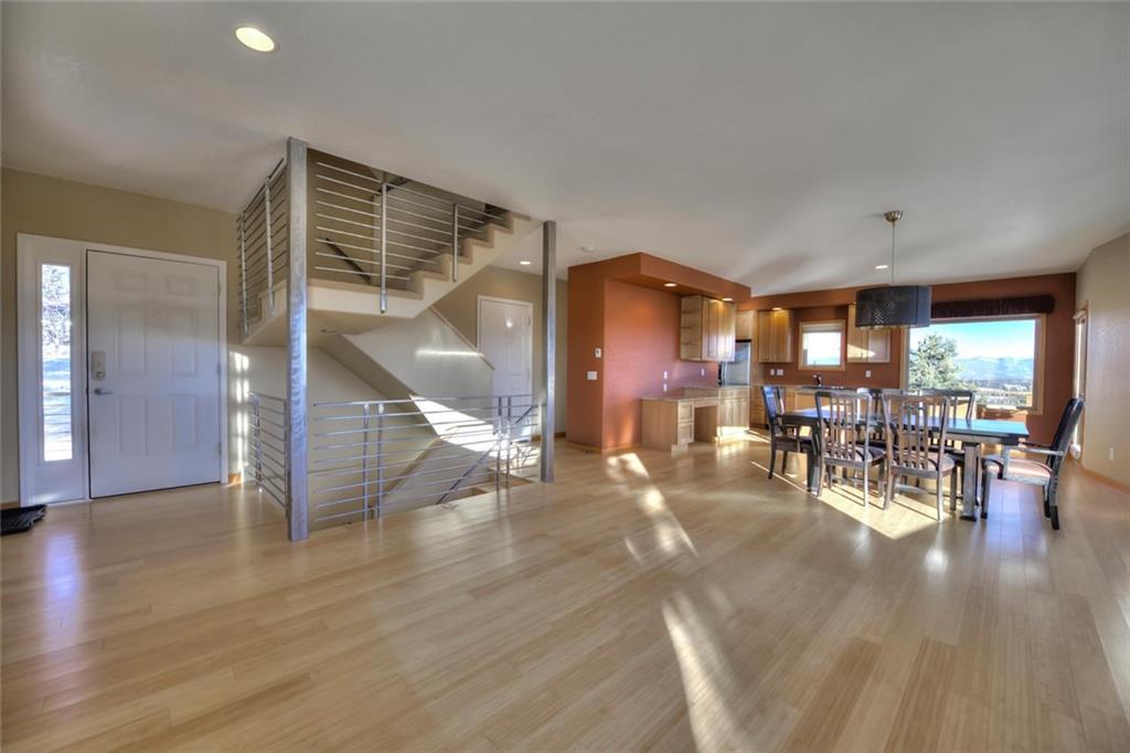 138 Teton Way Como, CO 80432 - Photo 8 of 35 a lobby with furniture and wooden floor
