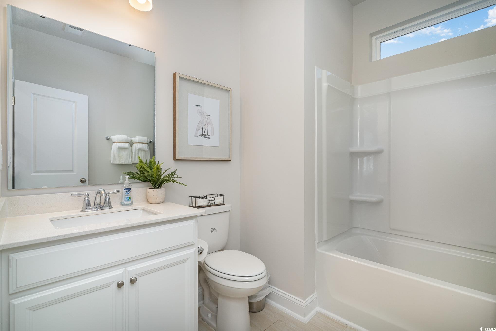 534 Haven View Way Murrells Inlet, SC 29576 - Photo 12 of 32 Bathroom with vanity, toilet, baseboards, and shower / bath combination