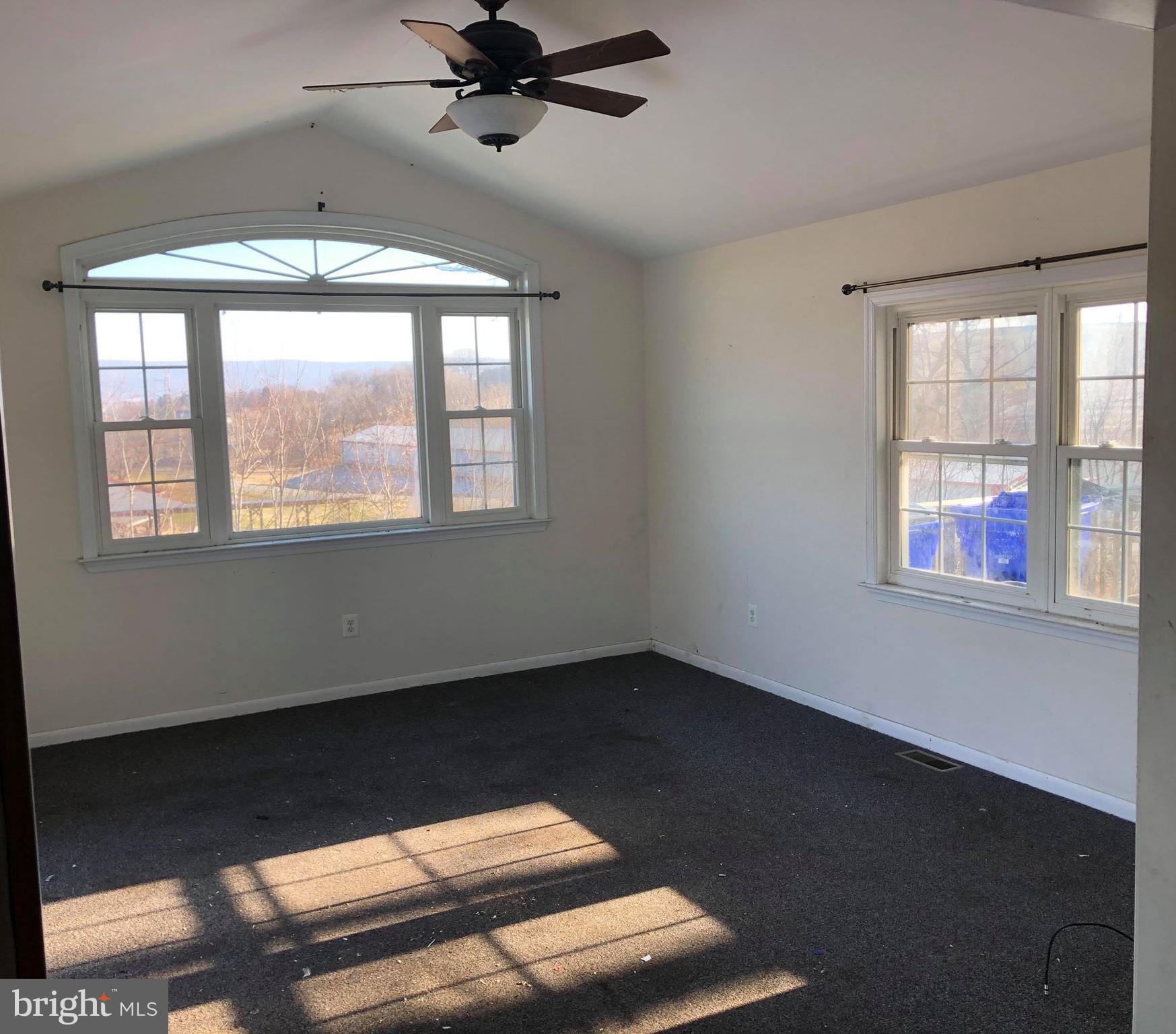 8307 Reno Monument Road Middletown, MD 21769 - Photo 8 of 16 a view of an empty room with a window