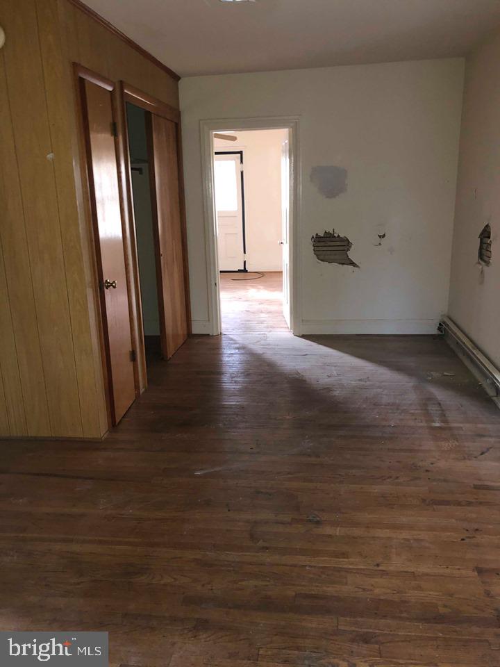 8307 Reno Monument Road Middletown, MD 21769 - Photo 10 of 16 a view of a room with wooden floor