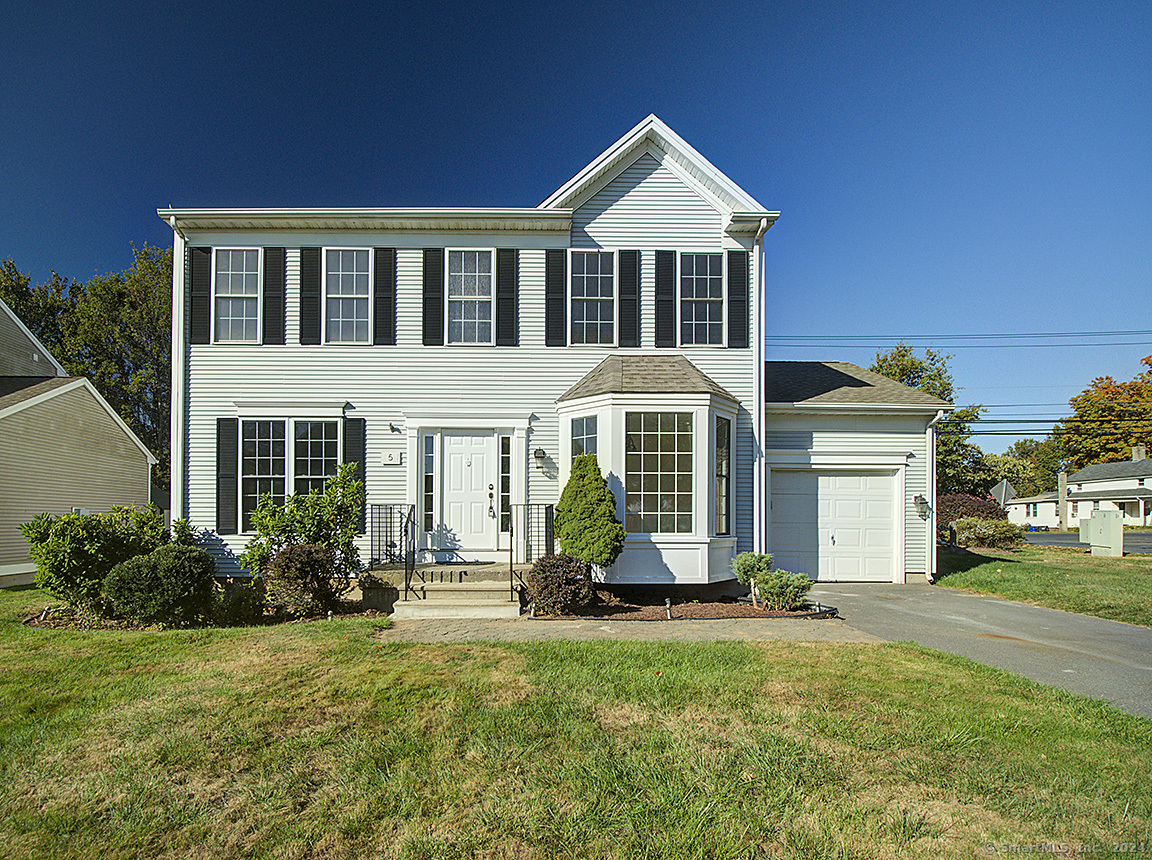 5 Mountain Laurel Way, Unit 5 Suffield, CT 06078 - Photo 1 of 1 a front view of a house with a yard