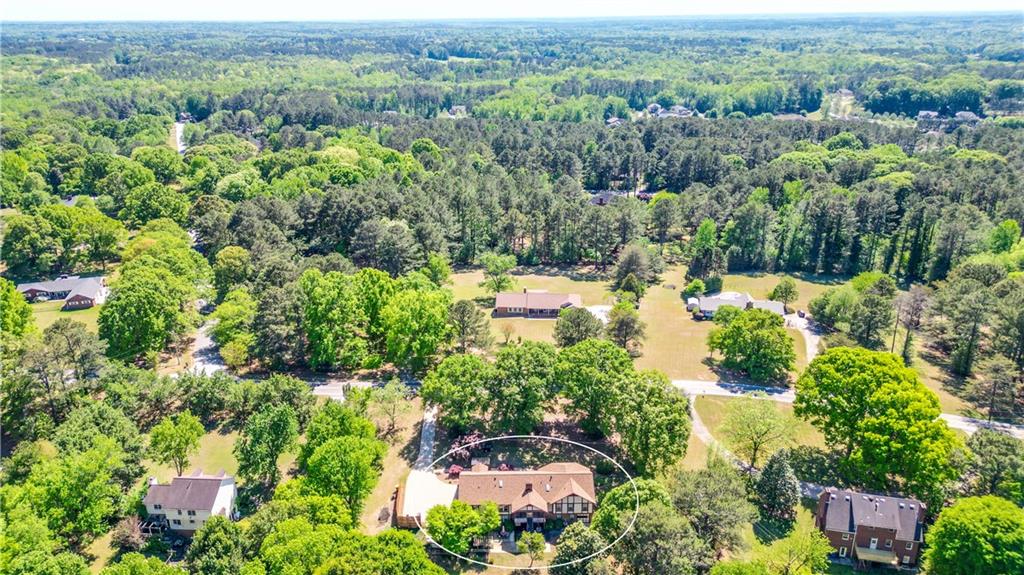130 Hawn Road Fayetteville, GA 30215 - Photo 2 of 67 an aerial view of a houses with a yard