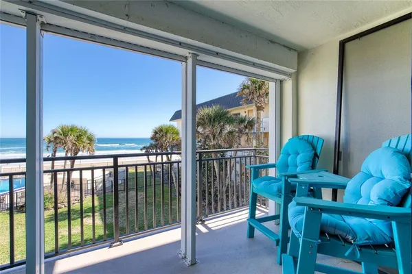 a view of a porch with furniture