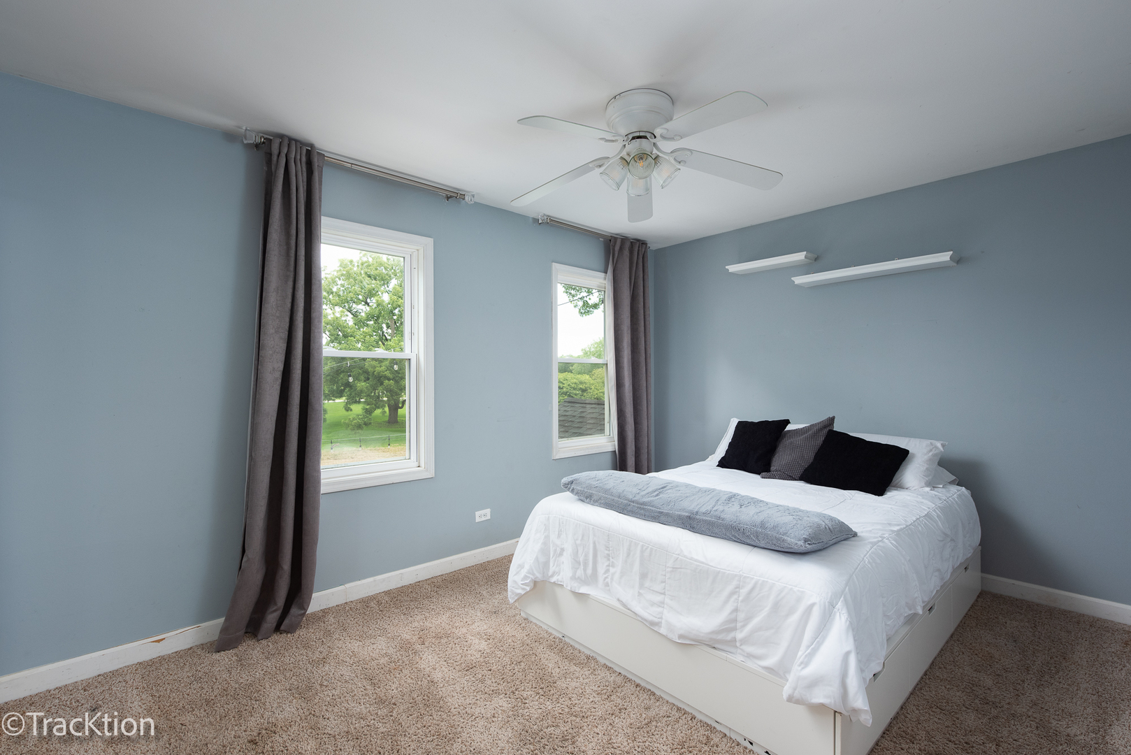 2184 Riverlea Circle Naperville, IL 60565 - Photo 12 of 20 a bedroom with a large bed and a window