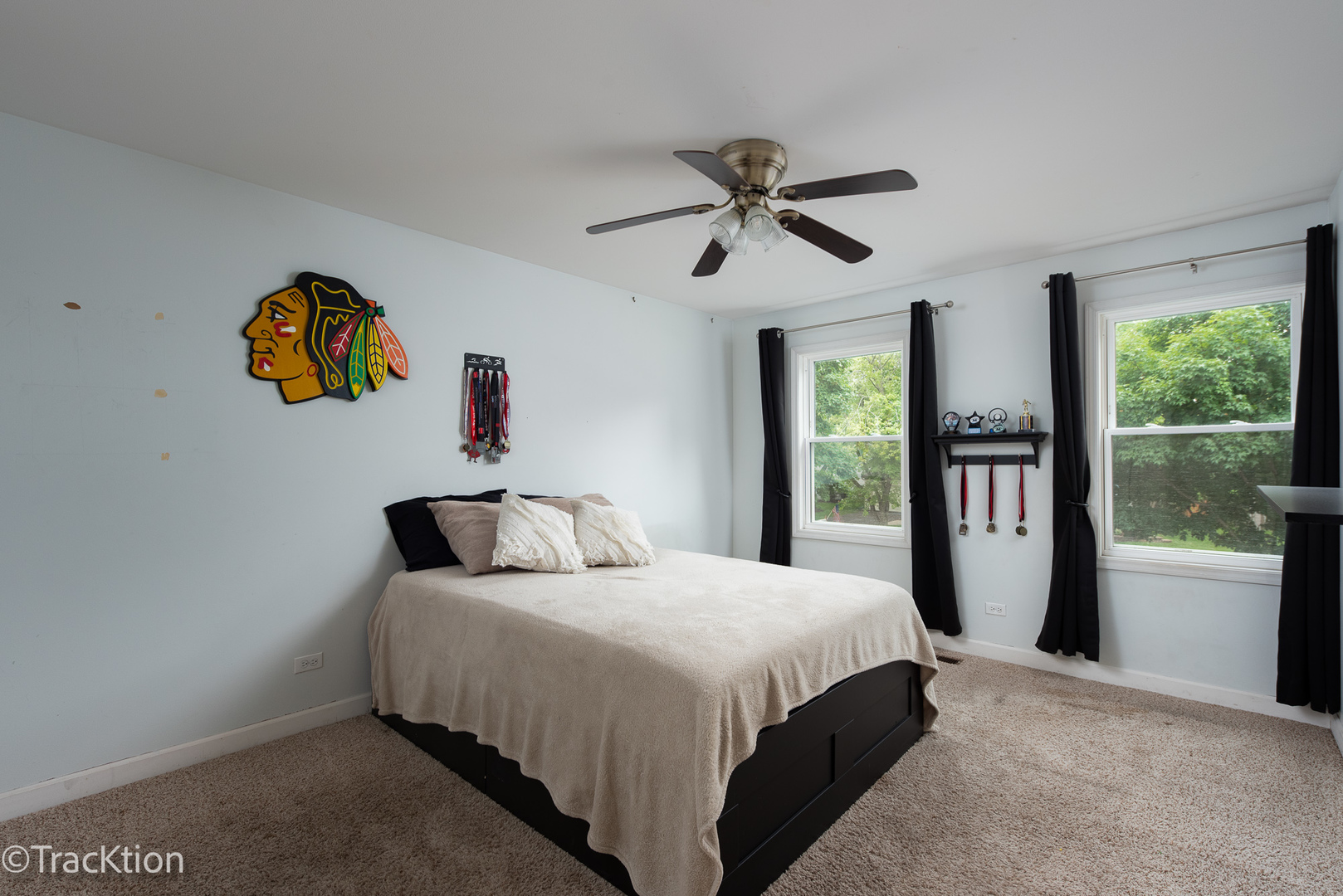 2184 Riverlea Circle Naperville, IL 60565 - Photo 13 of 20 a bedroom with a bed and a painting on the wall