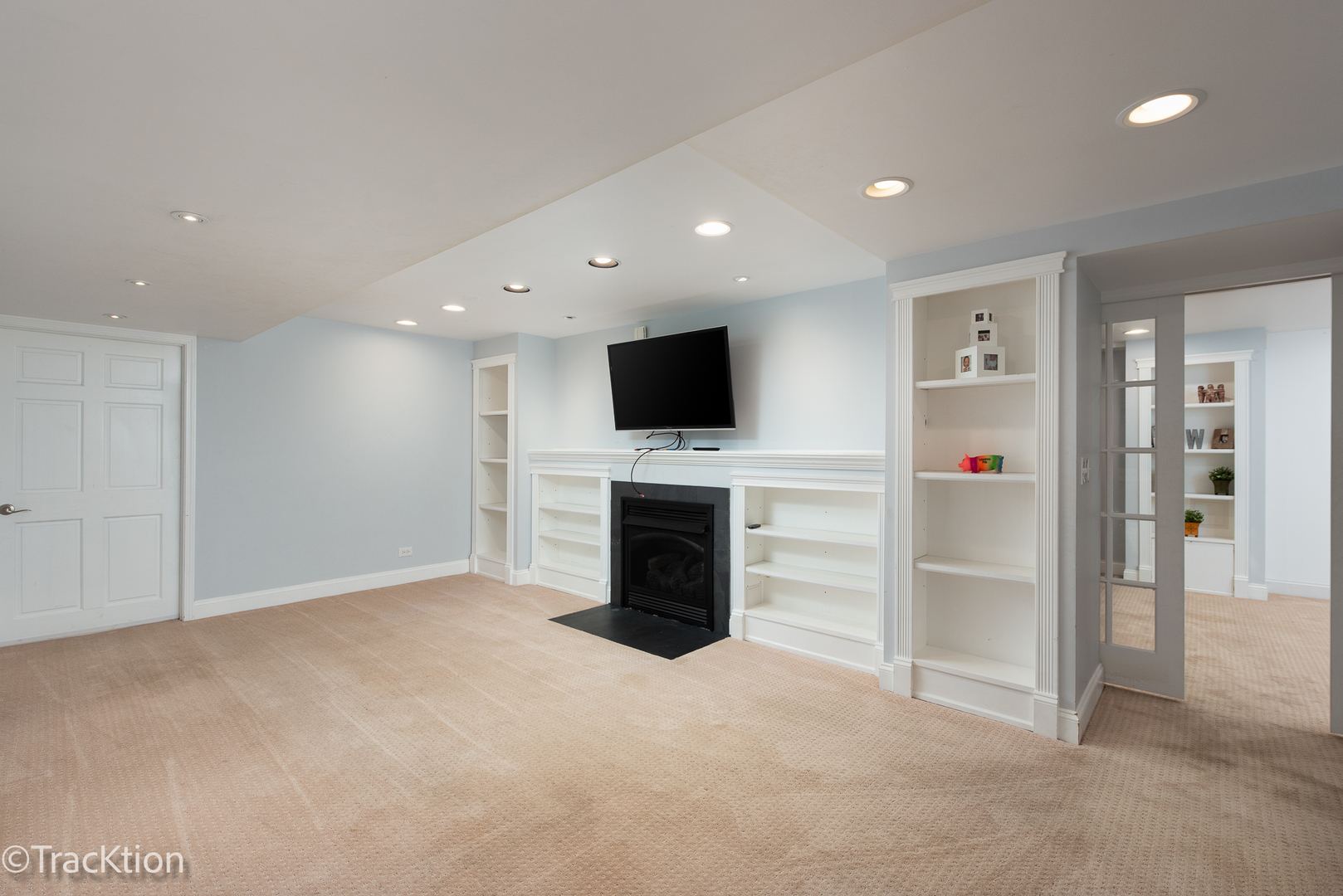 2184 Riverlea Circle Naperville, IL 60565 - Photo 16 of 20 a view of a kitchen with an entryway and a fireplace