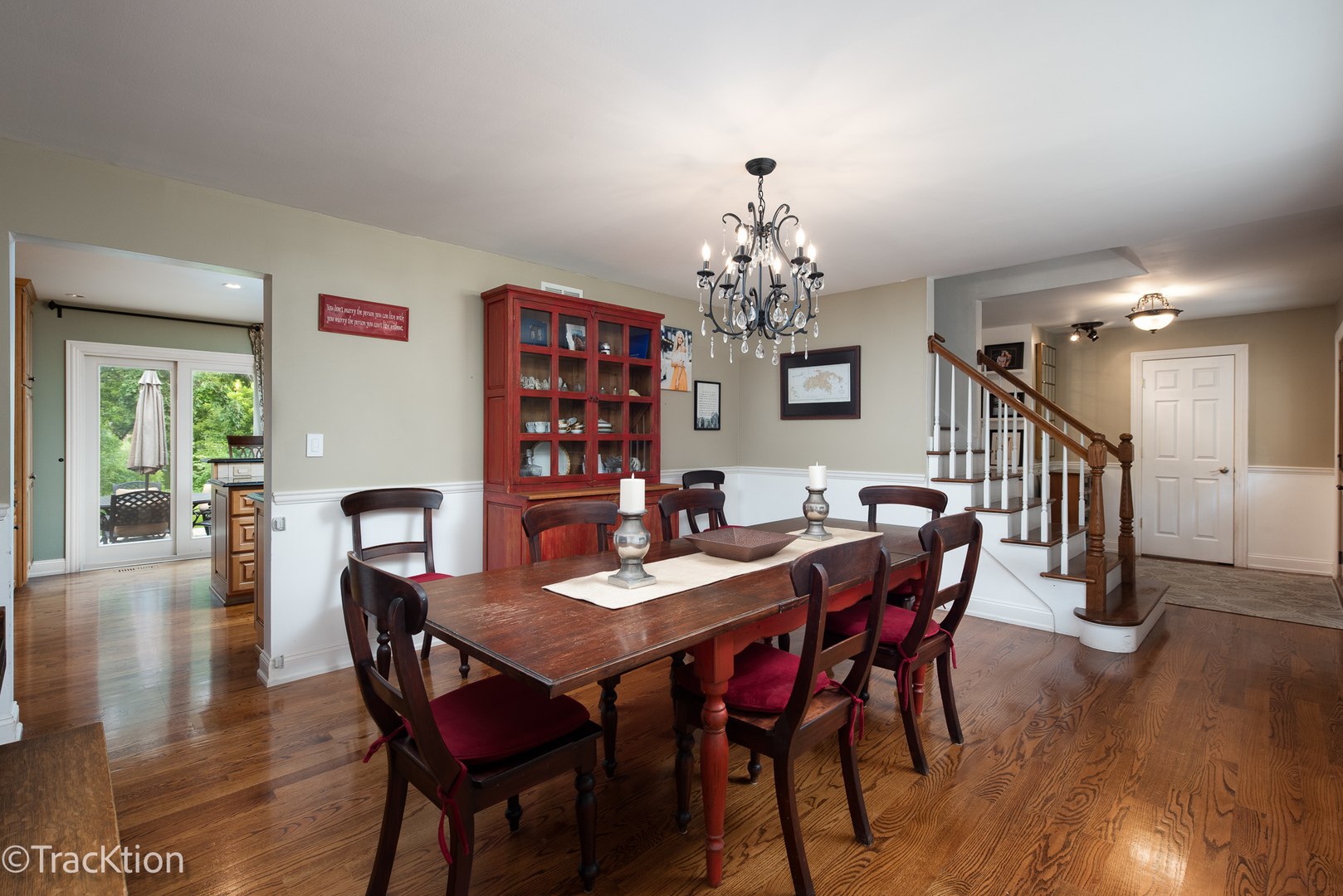 2184 Riverlea Circle Naperville, IL 60565 - Photo 2 of 20 a view of a dining room with furniture wooden floor and chandelier