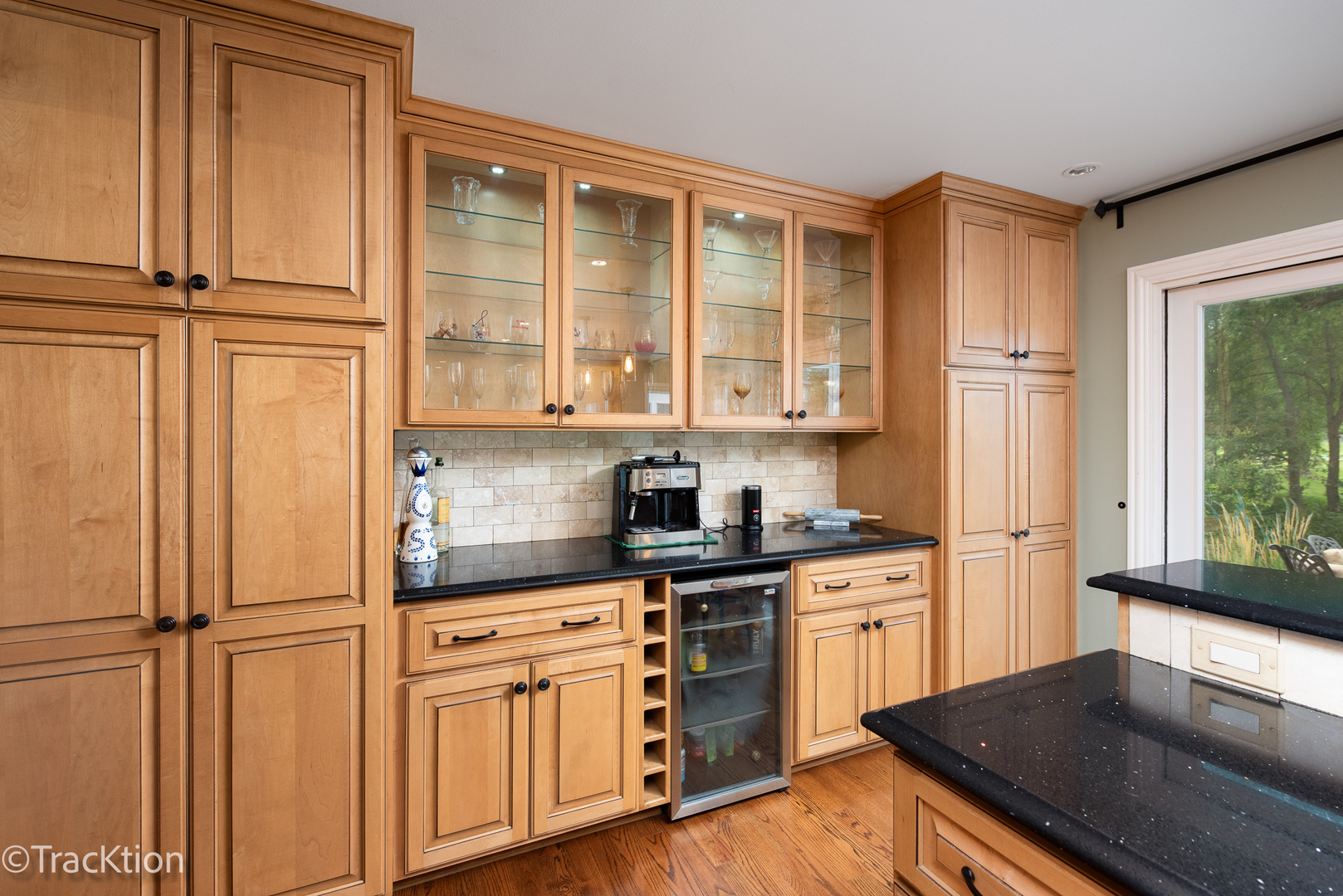 2184 Riverlea Circle Naperville, IL 60565 - Photo 4 of 20 a kitchen with white cabinets and white appliances