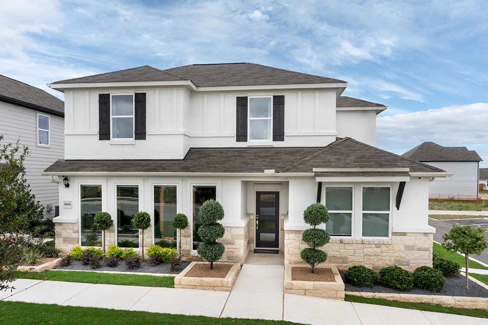 front view of a house with a yard