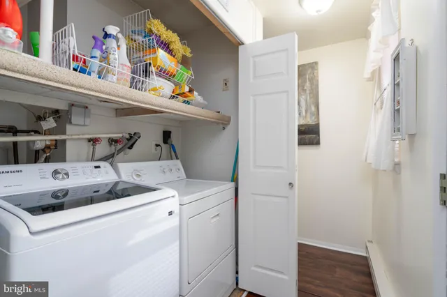 a utility room with dryer and washer