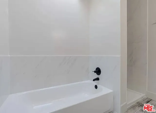 a bathroom with a bathtub