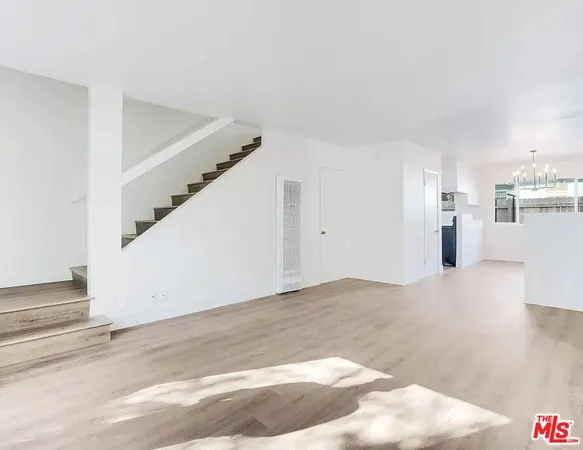 a view of a kitchen with a sink