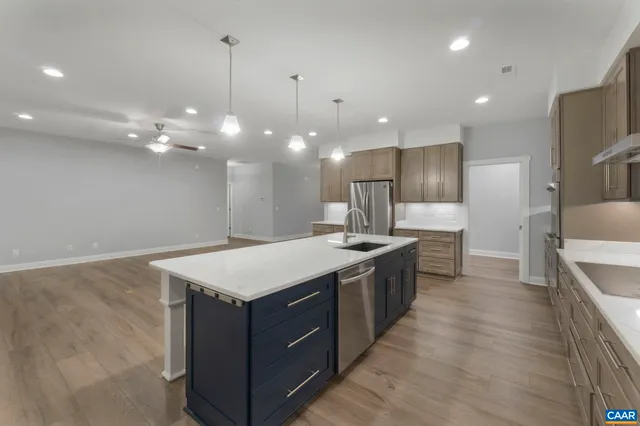 a view of storage and utility room with wooden floor