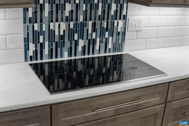 a view of an empty room with a large window