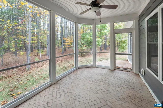 a front view of houses with yard
