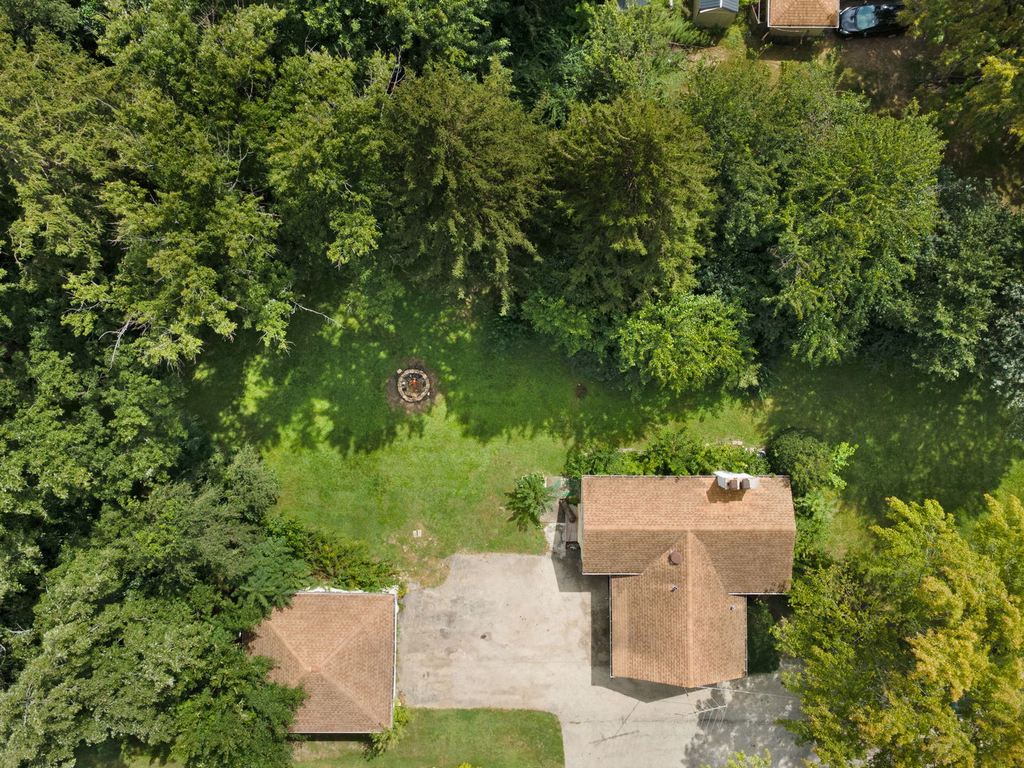 6295 Woodward Avenue Downers Grove, IL 60516 - Photo 1 of 6 an aerial view of a house with a yard