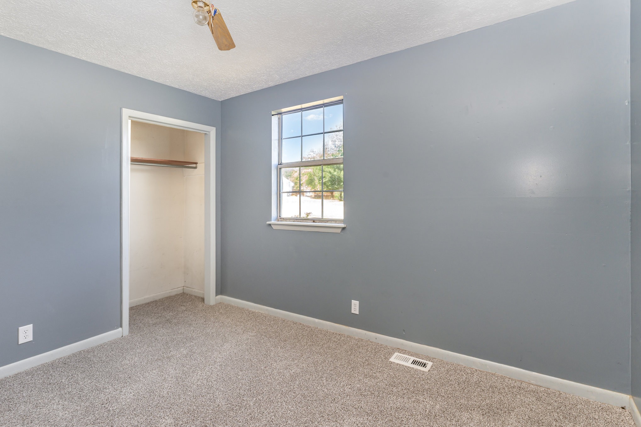 2104 Wolfe Road White Bluff, TN 37187 - Photo 15 of 23 an empty room with windows and closet