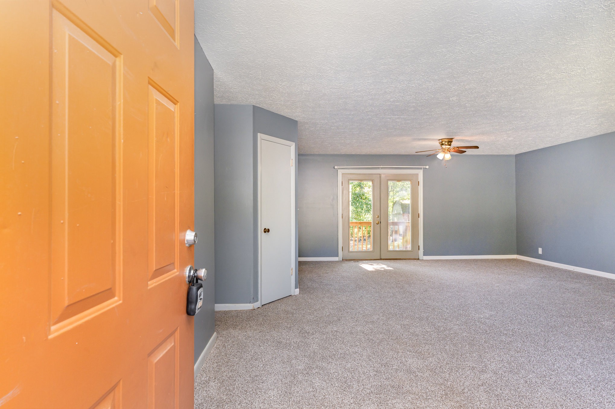 2104 Wolfe Road White Bluff, TN 37187 - Photo 3 of 23 a view of a livingroom with wooden floor and window