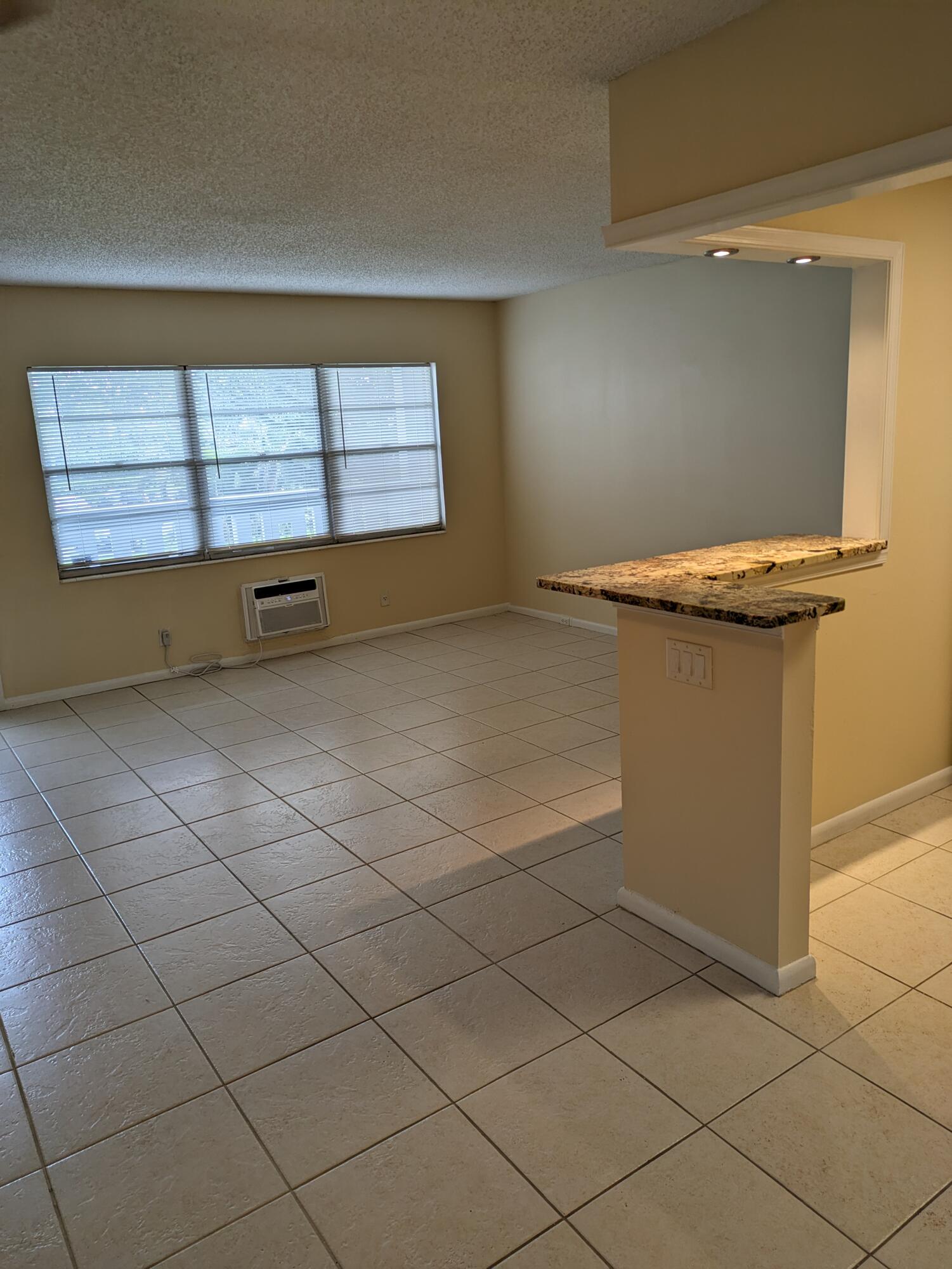 275 Suffolk F, Unit 275 Boca Raton, FL 33434 - Photo 4 of 12 Easy clean floor
