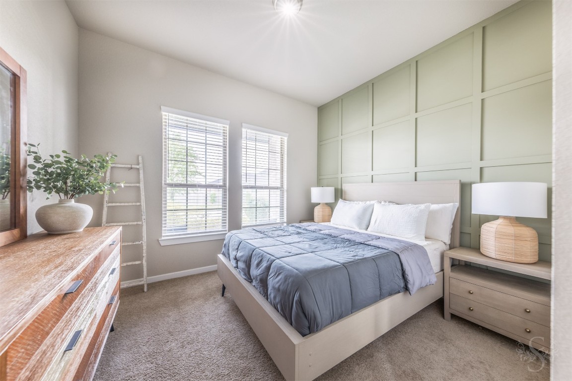 4410 Ana Ridge Lane Fulshear, TX 77441 - Photo 17 of 39 a bedroom with a bed and window