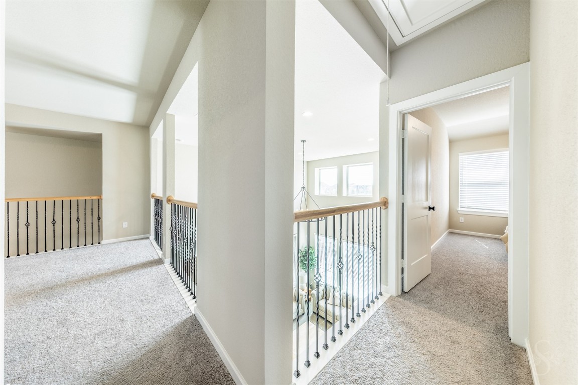 4410 Ana Ridge Lane Fulshear, TX 77441 - Photo 22 of 39 a view of a hallway with a porch