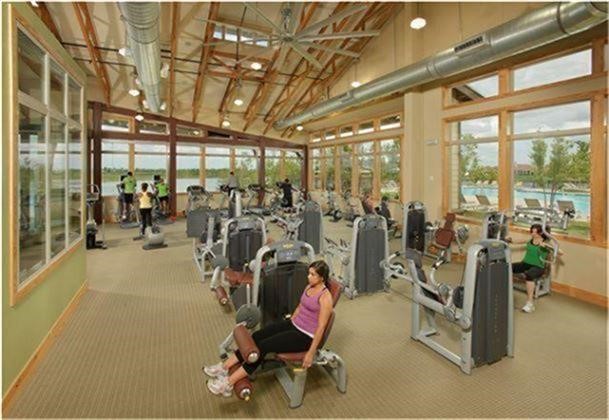 4410 Ana Ridge Lane Fulshear, TX 77441 - Photo 38 of 39 a view of a room with gym equipment