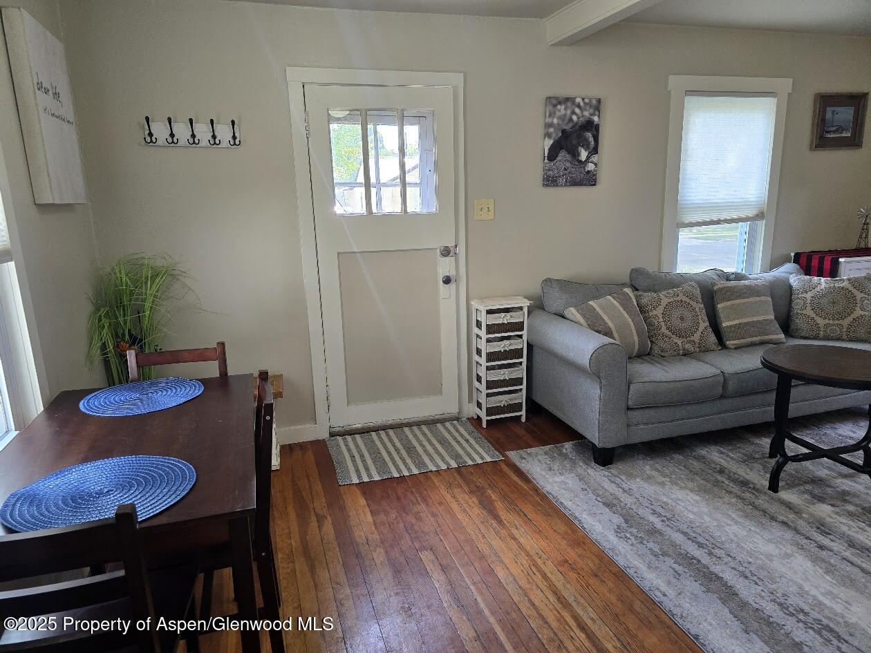 830 Breeze Street Craig, CO 81625 - Photo 11 of 18 a living room with furniture and wooden floor