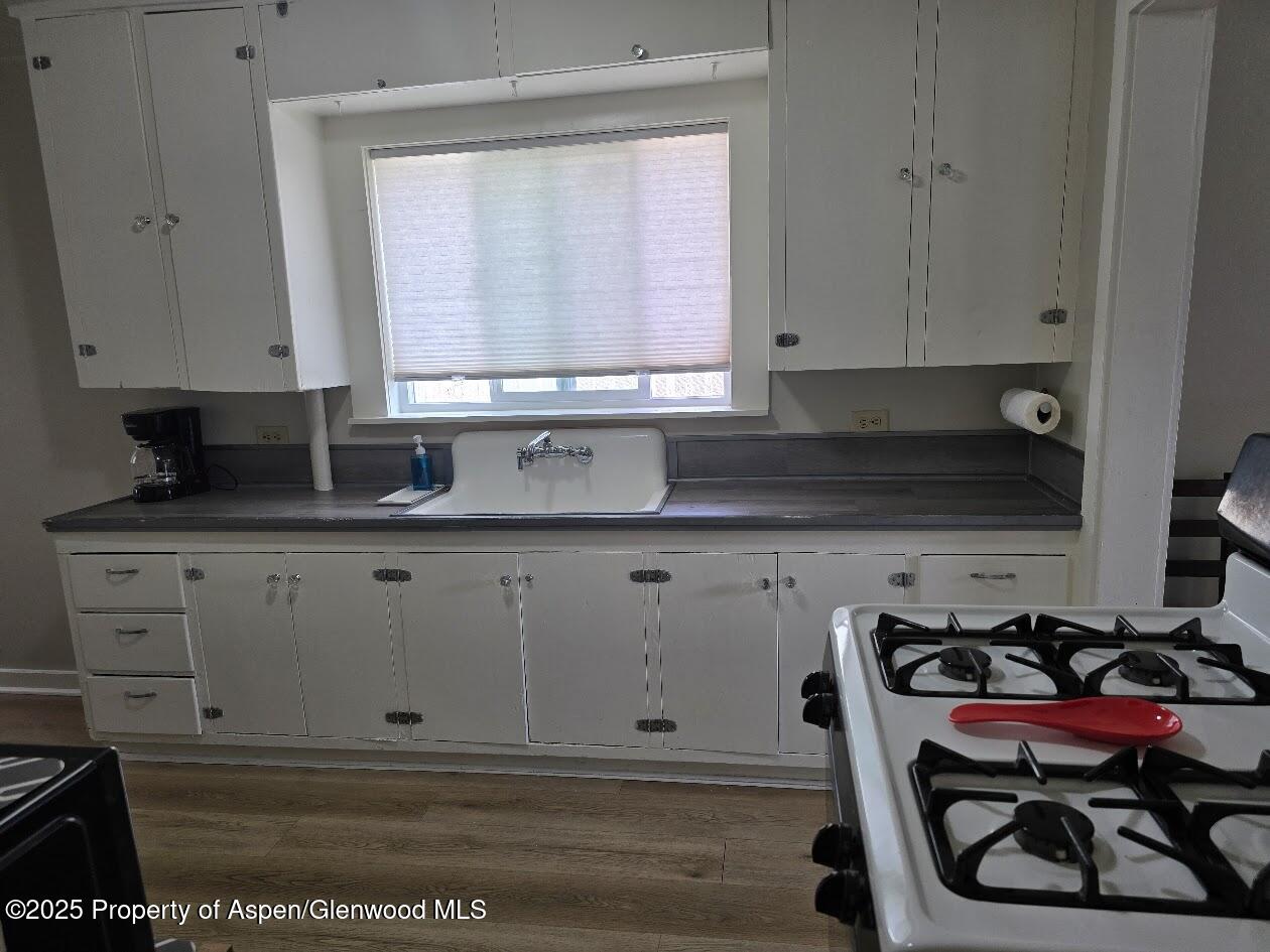 830 Breeze Street Craig, CO 81625 - Photo 5 of 18 a view of cabinets and window