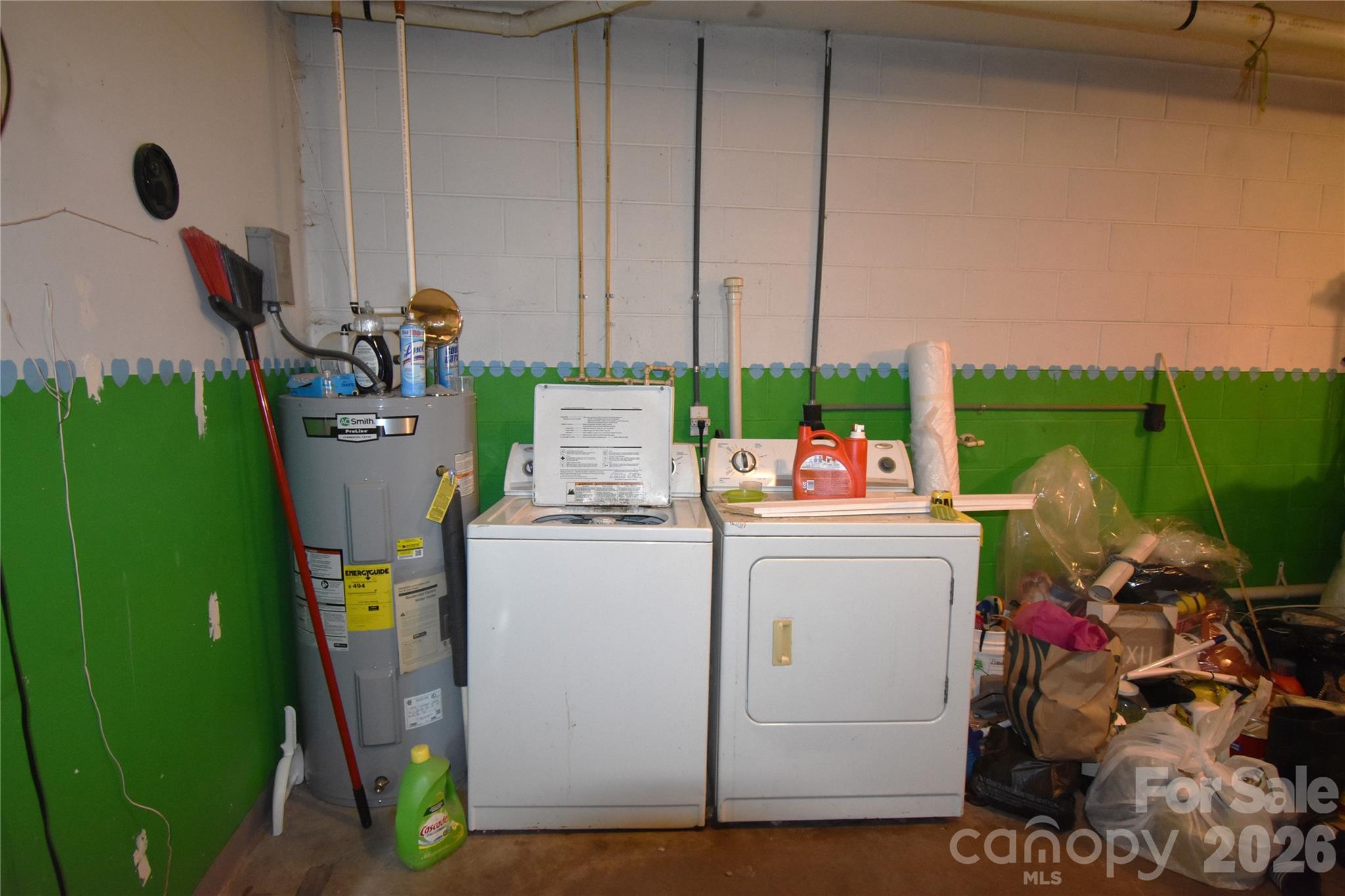 151 Cedar Valley Road Hudson, NC 28638 - Photo 18 of 23 a storage room with furniture and a potted plant