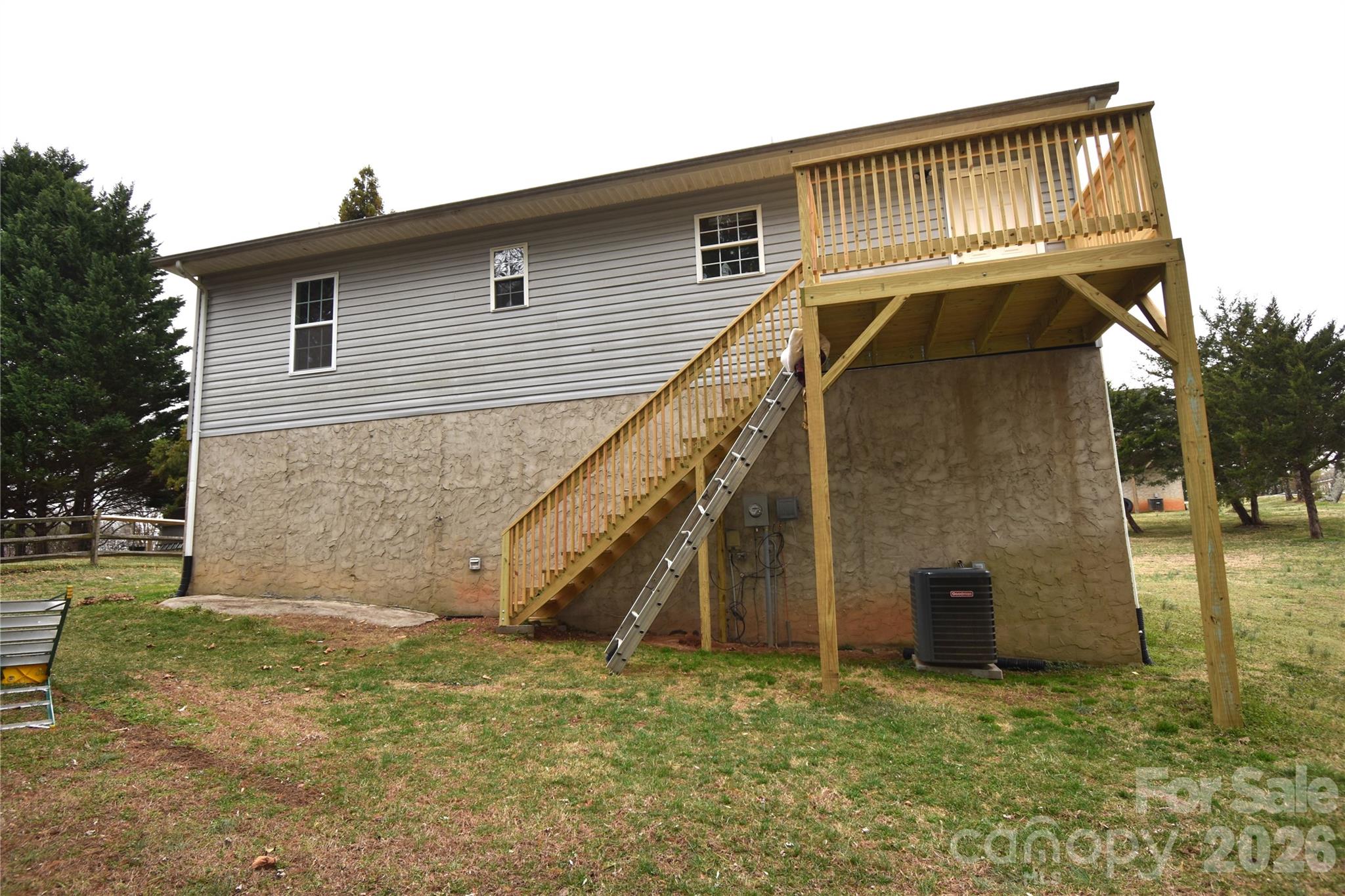 151 Cedar Valley Road Hudson, NC 28638 - Photo 22 of 23 a view of a house with a yard