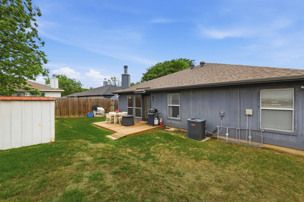 4217 Broken Arrow Road Fort Worth, TX 76137 - Photo 38 of 40 a view of a house with backyard and sitting area
