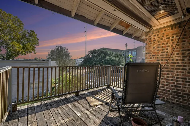a view of a chairs on the roof deck