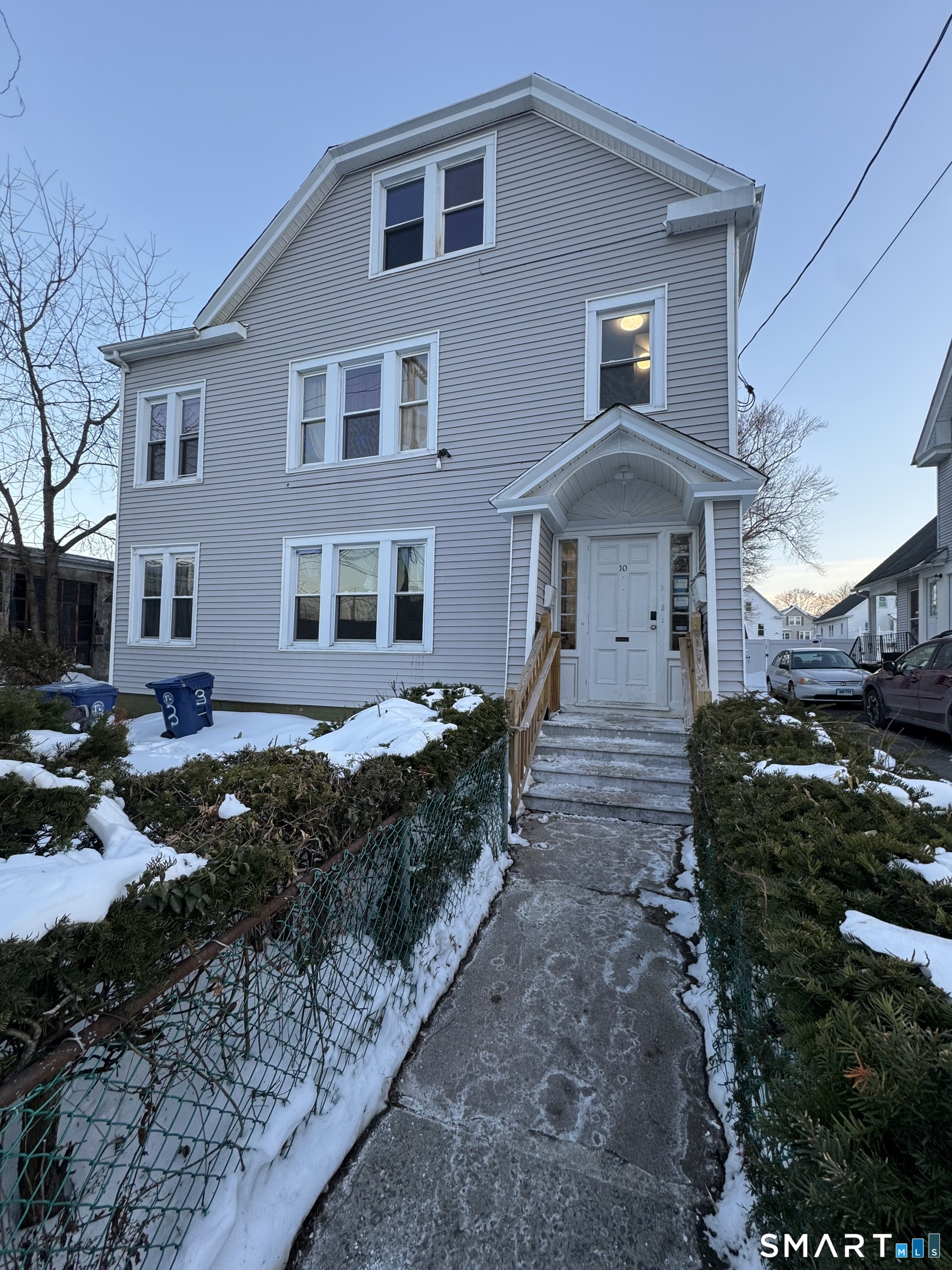 10 Lester Street, Unit 3 West Haven, CT 06516 - Photo 10 of 10 a front view of a house with a yard