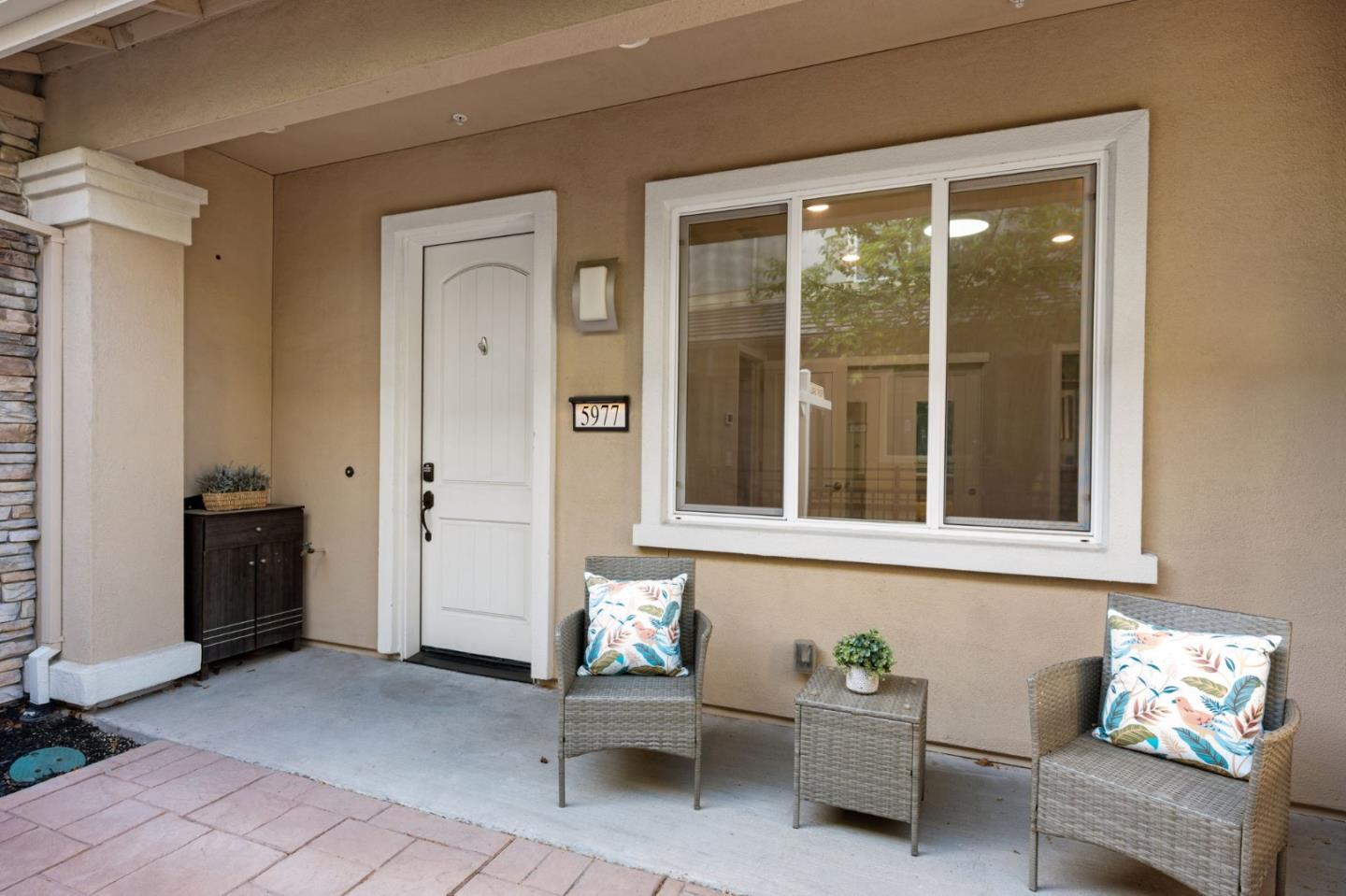 5977 Larkstone Loop San Jose, CA 95123 - Photo 4 of 63 a living room with furniture and windows