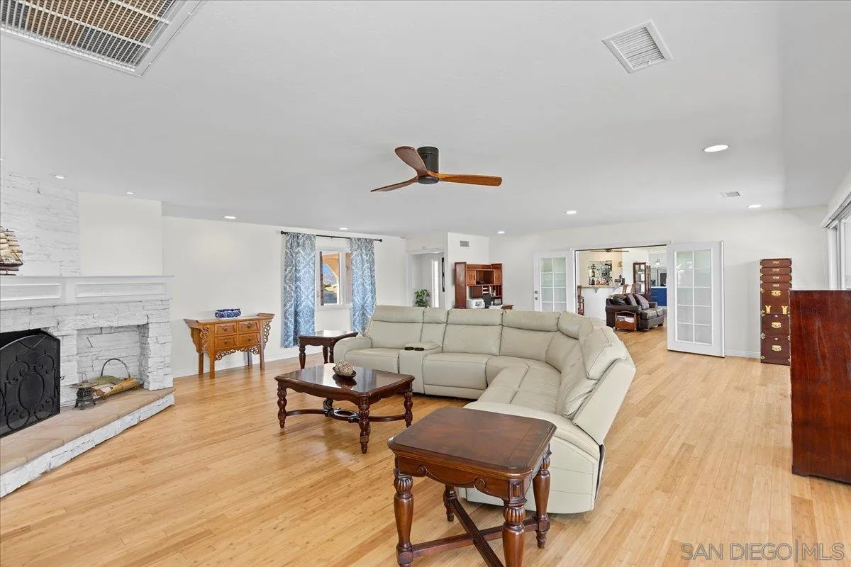20403 Rancho Villa Road Ramona, CA 92065 - Photo 19 of 66 a living room with furniture and a fireplace