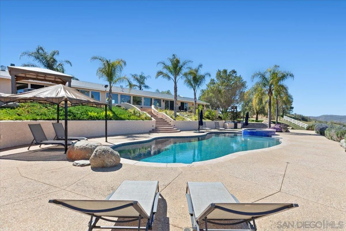 20403 Rancho Villa Road Ramona, CA 92065 - Photo 44 of 66 a view of a backyard with sitting area