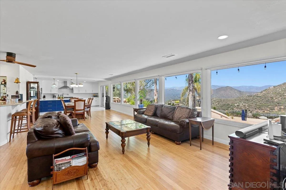 20403 Rancho Villa Road Ramona, CA 92065 - Photo 7 of 66 a living room with furniture and a large window
