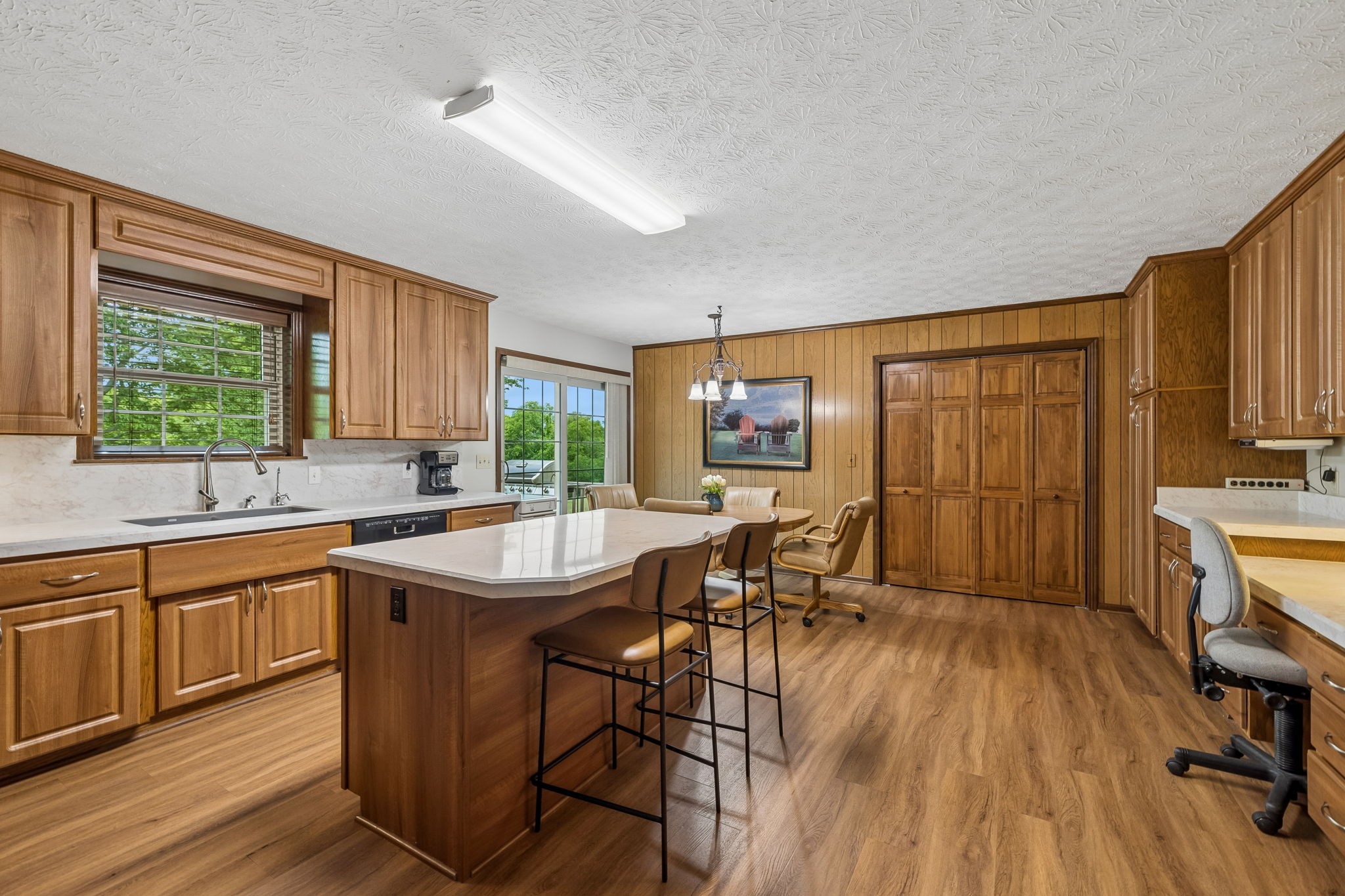 20 Riverbend Lane Carthage, TN 37030 - Photo 17 of 71 a kitchen with granite countertop a table chairs stove and sink