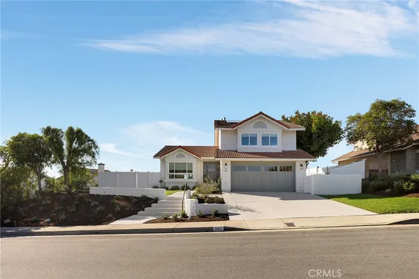 a house view with a outdoor space