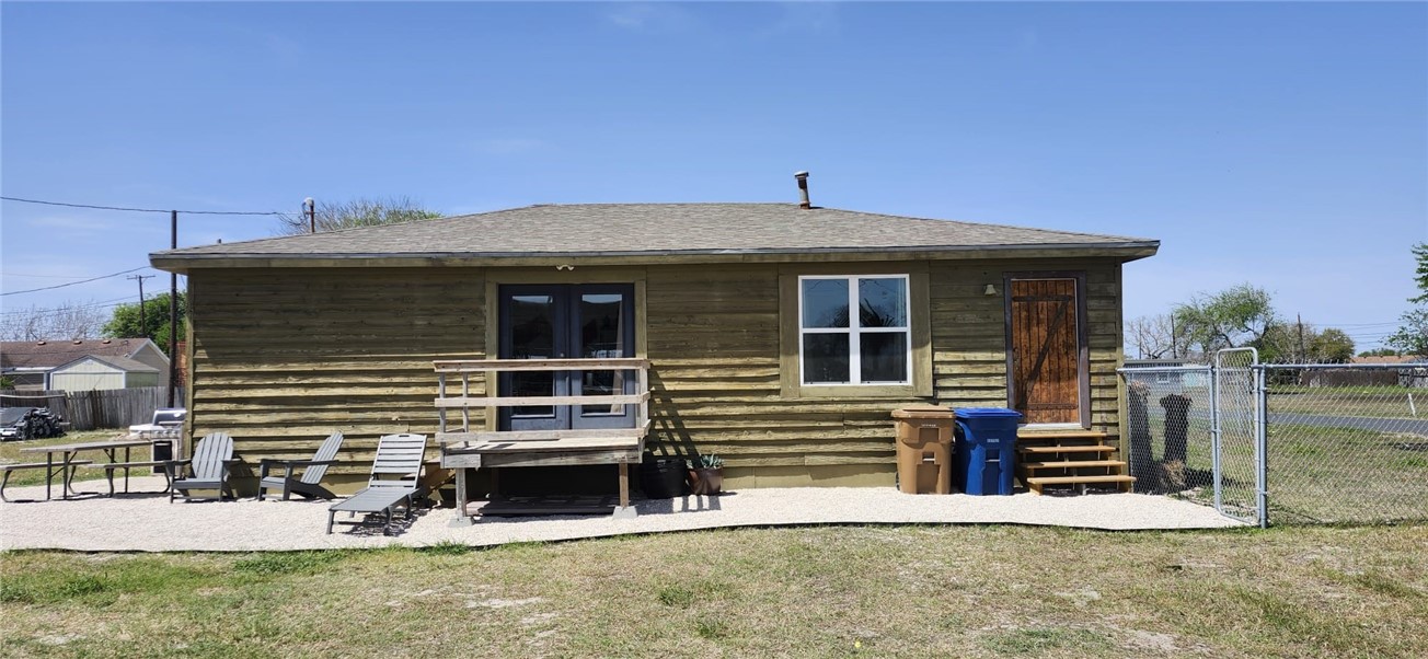 a front view of a house with garage