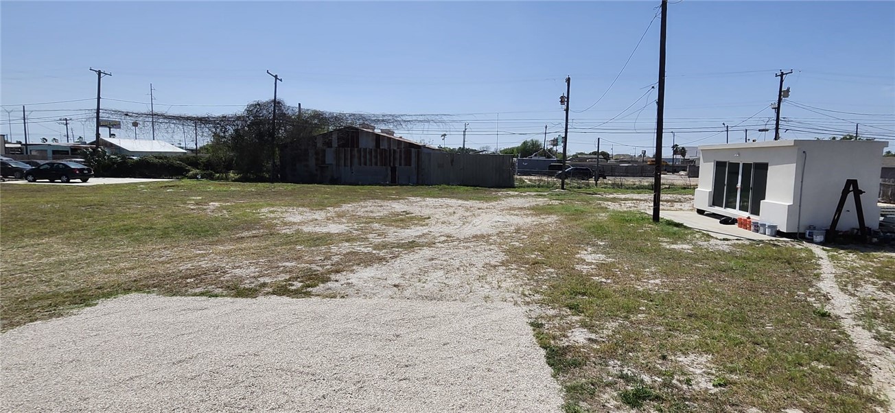1407 Dema Street Corpus Christi, TX 78418 - Photo 8 of 19 a swimming pool with yard and outdoor view