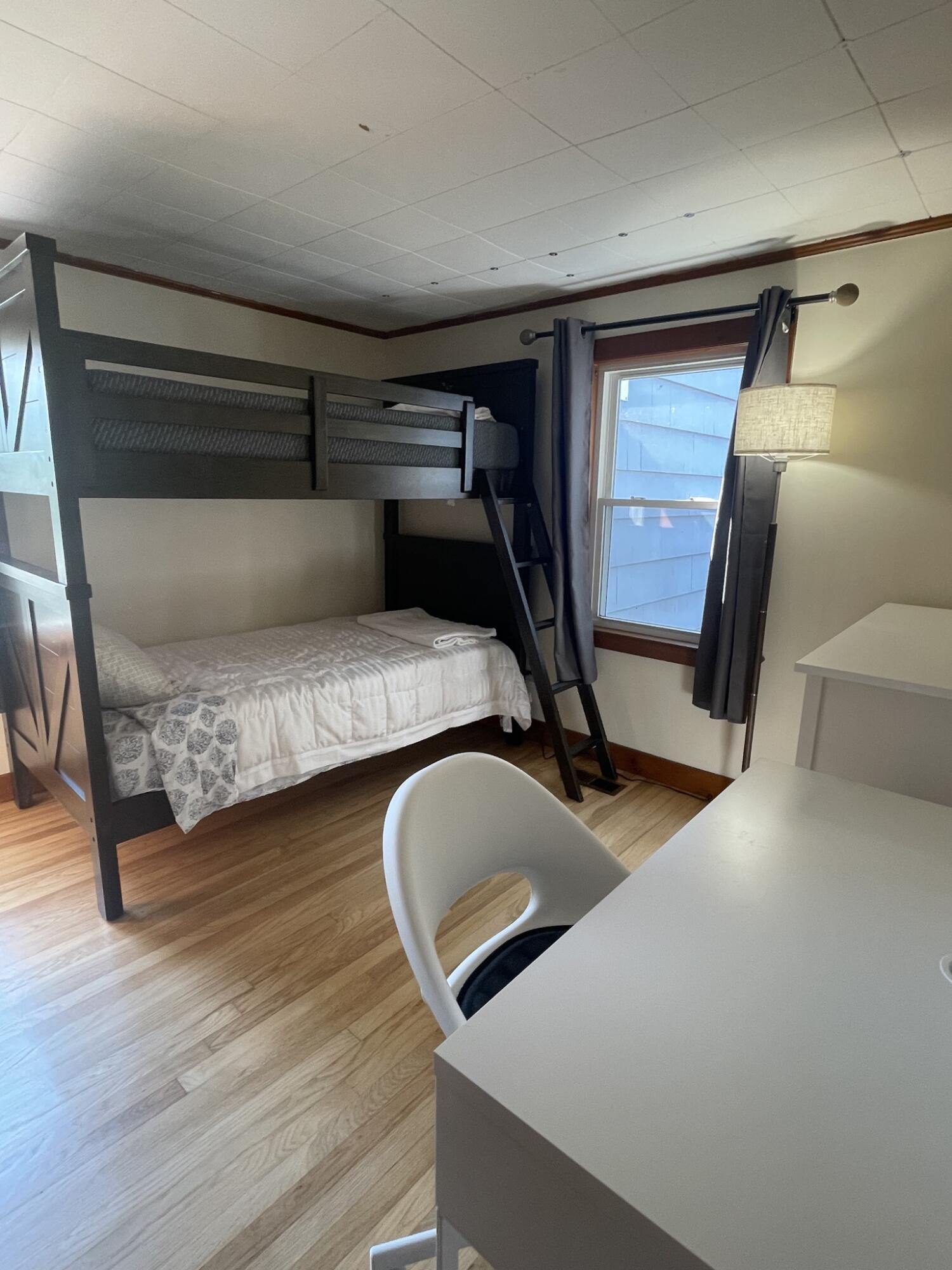 358 Strawberry Hill Road Centerville, MA 02632 - Photo 11 of 11 a bedroom with furniture and a window