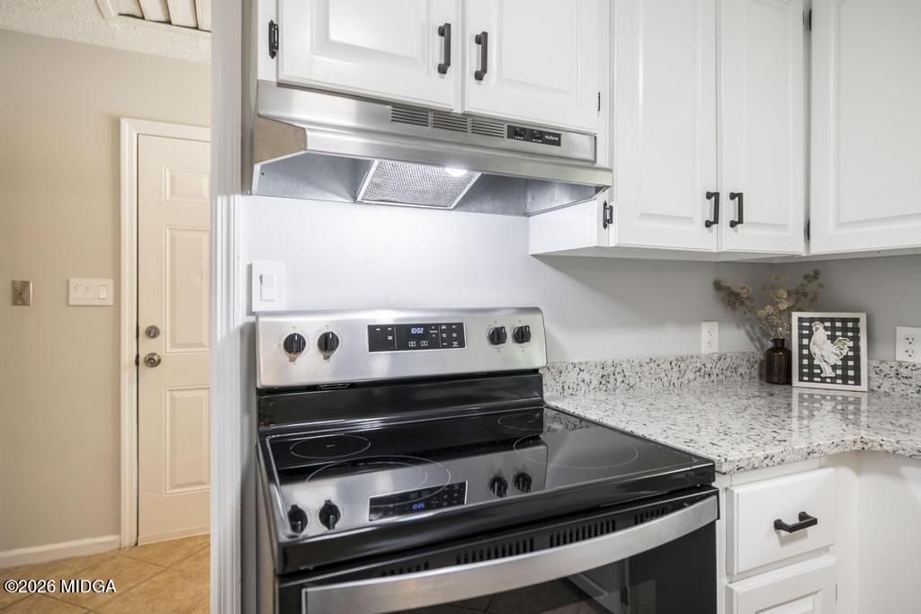 3365 Highway 80 Roberta, GA 31078 - Photo 12 of 41 a stove top oven sitting inside of a kitchen